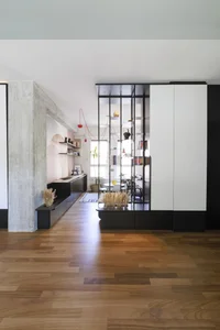 Milanese Minimalism: A Sun-Drenched 60m2 Apartment Redefined by Light and Iron Frames - image 12