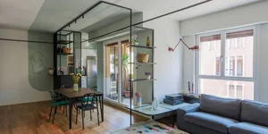 Milanese Minimalism: A Sun-Drenched 60m2 Apartment Redefined by Light and Iron Frames - image 14