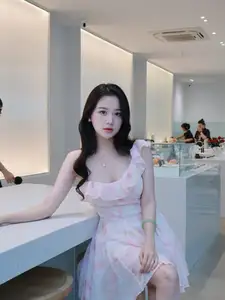 Gentle Charm: Beautiful Girl in Pink Floral Dress, Captivating Elegant Style. - image 1