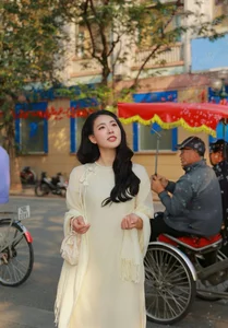 Timeless Elegance of Hanoi in a Traditional Silk Ao Dai - image 5