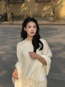 Timeless Elegance of Hanoi in a Traditional Silk Ao Dai - image 1