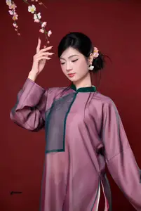 East Asian Grace: Elegant Lady in Traditional Attire & Cherry Blossoms - image 4