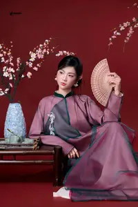 East Asian Grace: Elegant Lady in Traditional Attire & Cherry Blossoms - image 2