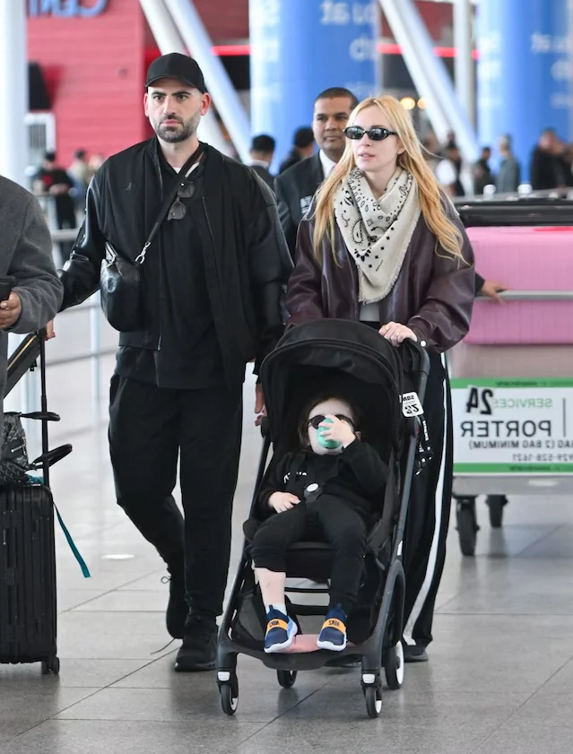 Lindsay Lohan and Husband Bader Shammas Arrive in New York City with Son Luai After Departing Dubai: Celebrity Family Travel Style