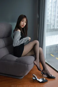 Mei Zi: Relaxed Elegance in Black Silk on the Sofa - image 18