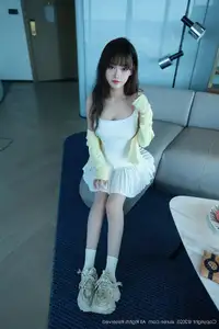 Discover Nuo Mi's Alluring Elegance in a Pristine White Dress - Exclusive XiuRen Collection No.10702 - image 6
