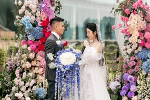 Inside the Lavish Wedding of Football Star Quang Hai and Chu Thanh Huyen: A Celebration and Big Baby Announcement - image 4