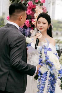 Inside the Lavish Wedding of Football Star Quang Hai and Chu Thanh Huyen: A Celebration and Big Baby Announcement - image 12