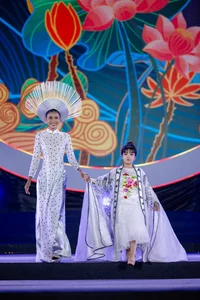The Art of Elegance: Discovering the Co Linh Hand-Painted Ao Dai Collection by Designer Chau Loan - image 1