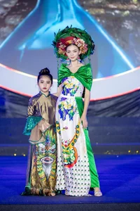 The Art of Elegance: Discovering the Co Linh Hand-Painted Ao Dai Collection by Designer Chau Loan - image 4