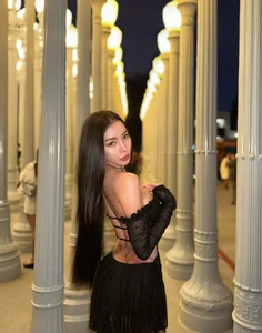 Stunning Thai Influencer Showcases Bold Bikini Style and Unique Body Art in Latest Gallery - image 6