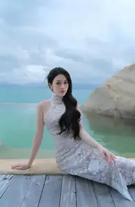 Elegant Beauty on the Waves: White Dress Muse Cruises the Azure Sea - image 3