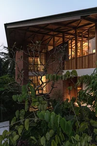 Sustainable 3-Story Home Featuring Traditional Coconut Wood Roofing and Local Architecture - image 3