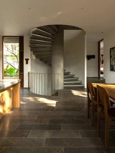 Sustainable 3-Story Home Featuring Traditional Coconut Wood Roofing and Local Architecture - image 8
