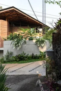 Sustainable 3-Story Home Featuring Traditional Coconut Wood Roofing and Local Architecture - image 15