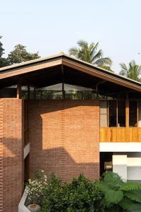 Sustainable 3-Story Home Featuring Traditional Coconut Wood Roofing and Local Architecture - image 26