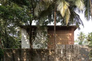 Sustainable 3-Story Home Featuring Traditional Coconut Wood Roofing and Local Architecture - image 4