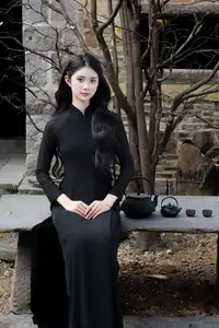 Timeless Beauty: Graceful Vietnamese Lady in Black Ao Dai Captivates with Asian Elegance. - image 7