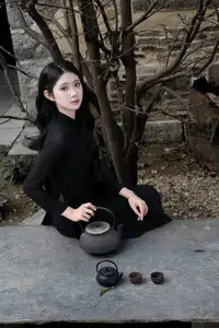 Timeless Beauty: Graceful Vietnamese Lady in Black Ao Dai Captivates with Asian Elegance. - image 5