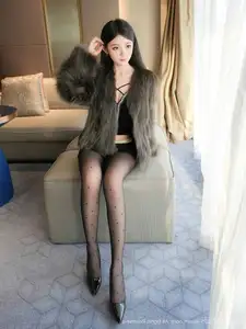 XiuRen No.10045 You Jiang: Elegant Allure in Chic Black Fashion - image 13
