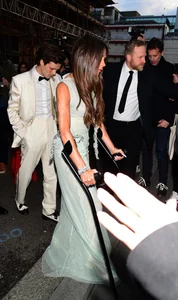 Victoria Beckham Celebrates Milestone 50th Birthday in Style Despite Glamorous Crutches and Sheer Elegance - image 6