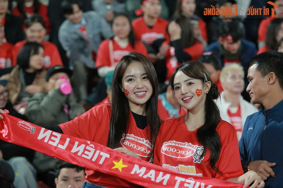 Hanoi Beauty Steals the Spotlight While Cheering for the Vietnam National Football Team