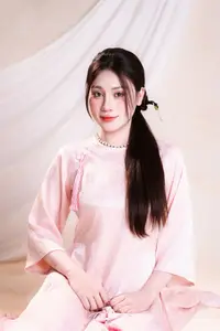 Vietnamese Beauty: Graceful in Traditional Pink Ao Dai and Conical Hat - image 3
