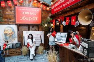 Patriotic Cafe Trends: Crowds Gather at Red Flag with Yellow Star Decorated Coffee Shops in Vietnam - image 0