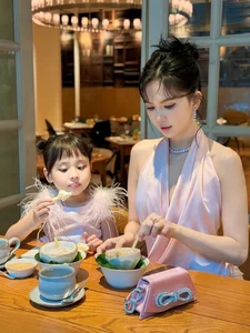 Style Comparison: The Glamorous Aesthetics of Tra Ngoc Hang and Ngoc Trinh Explored - image 1