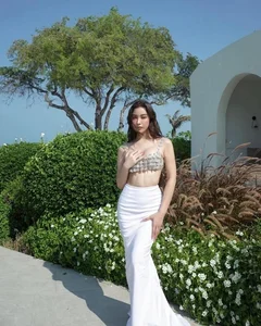 Thai Beauty Captivates Social Media with Bold Fashion and Celebrity Connections - image 3
