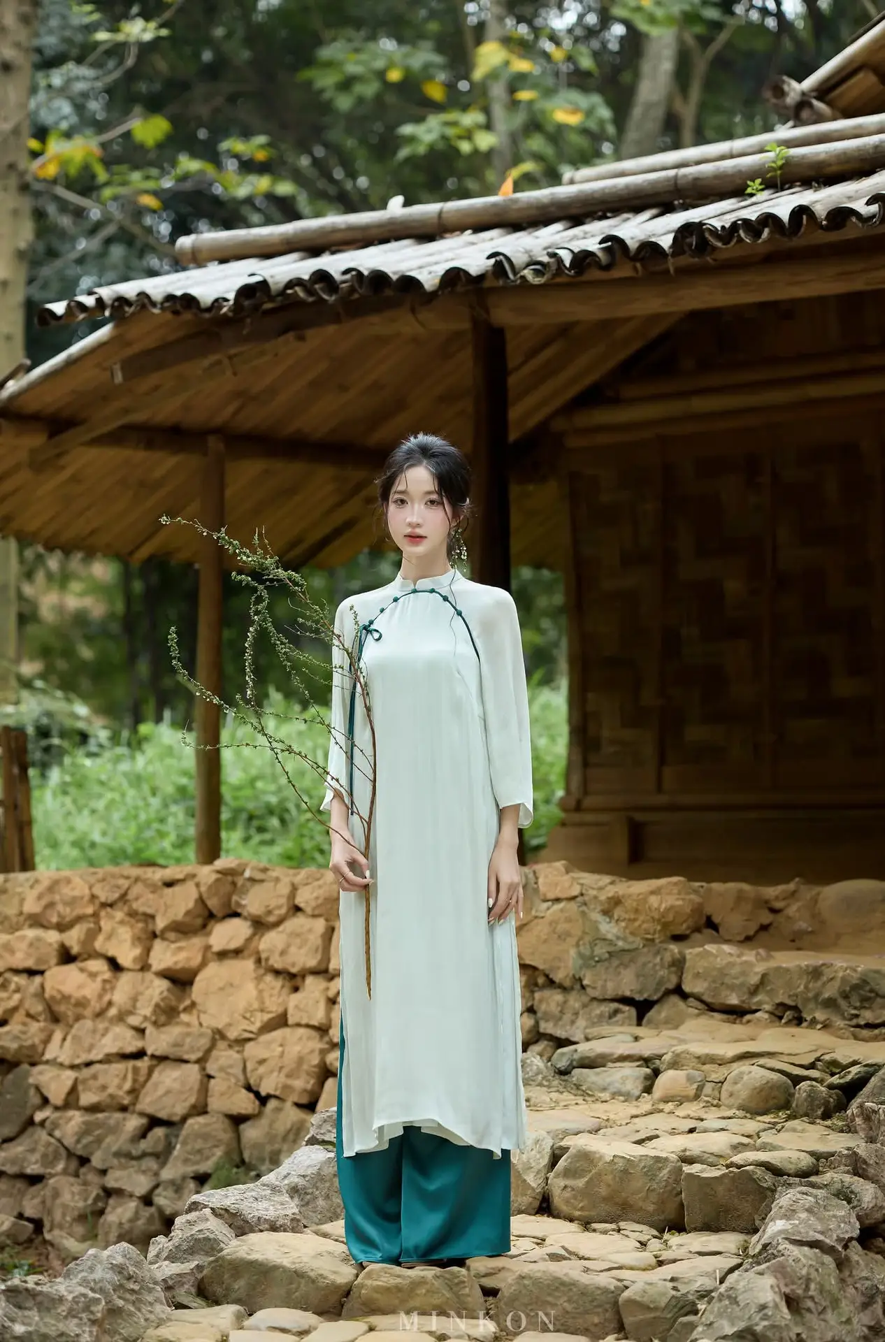 Vietnamese Grace: Elegant Portrait of a Young Woman in Lush Nature