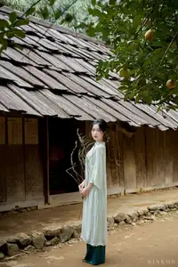 Vietnamese Grace: Elegant Portrait of a Young Woman in Lush Nature - image 4
