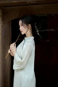 Vietnamese Grace: Elegant Portrait of a Young Woman in Lush Nature - image 17