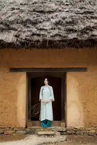 Vietnamese Grace: Elegant Portrait of a Young Woman in Lush Nature - image 3