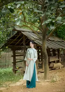 Vietnamese Grace: Elegant Portrait of a Young Woman in Lush Nature - image 12