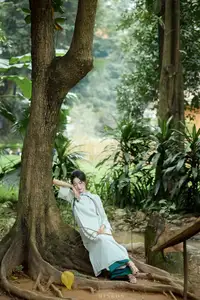 Vietnamese Grace: Elegant Portrait of a Young Woman in Lush Nature - image 1