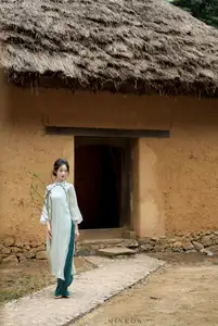 Vietnamese Grace: Elegant Portrait of a Young Woman in Lush Nature - image 6