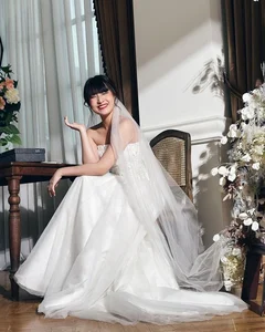 Stunning IELTS 8.5 Scholar Turns Heads in Elegant Wedding Gown: Who is the Lucky Groom? - image 0