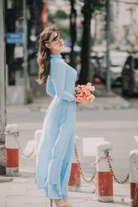 Elegant Pastel Blue Ao Dai in the Heart of the City - image 2