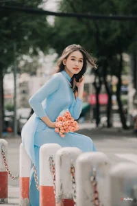 Elegant Pastel Blue Ao Dai in the Heart of the City - image 0