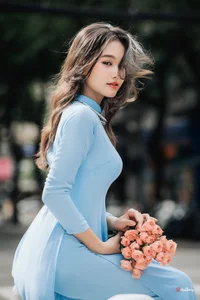 Elegant Pastel Blue Ao Dai in the Heart of the City - image 3