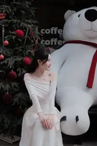 Elegant Girl in Off-Shoulder White Dress Welcoming Christmas, Showcasing Gentle Beauty and Holiday Season Style. 1000027390 - image 2
