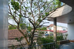 V1 House in Vinh: A 4-Story Townhouse Blending Open Architecture and Heritage - image 30