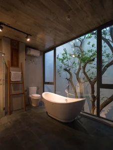 V1 House in Vinh: A 4-Story Townhouse Blending Open Architecture and Heritage - image 13