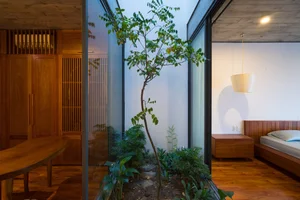 V1 House in Vinh: A 4-Story Townhouse Blending Open Architecture and Heritage - image 15