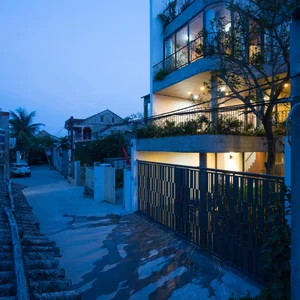 V1 House in Vinh: A 4-Story Townhouse Blending Open Architecture and Heritage - image 14