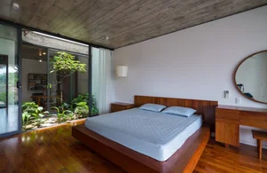 V1 House in Vinh: A 4-Story Townhouse Blending Open Architecture and Heritage - image 1