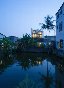 V1 House in Vinh: A 4-Story Townhouse Blending Open Architecture and Heritage - image 28