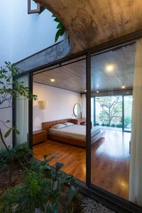 V1 House in Vinh: A 4-Story Townhouse Blending Open Architecture and Heritage - image 6