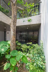 V1 House in Vinh: A 4-Story Townhouse Blending Open Architecture and Heritage - image 20